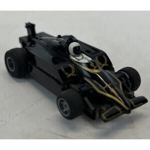 TYCO F1 440-X2 Slot Car Lotus Indy Car #11 Black Gold – Faded Paint